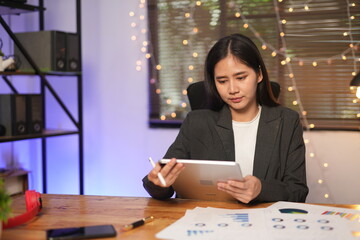 Asian woman working in an office