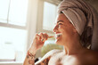© Malambo/peopleimages.com - Woman, happy or brushing teeth in bathroom for oral care, dental hygiene or cleaning routine. Girl, smile or bamboo brush in home for health, fresh breath or plaque control with eco friendly product