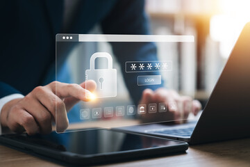 Wall Mural - cyber ​​security and internet data protection, businessman using laptop and tablet with padlock icon