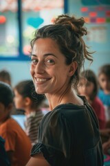 A woman smiling and interacting with a group of children