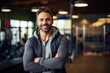 © Markus Schröder - Portrait of a happy man in his 30s sporting a rugged denim jacket on dynamic fitness gym background