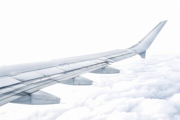Wall Mural - airplane wing soaring above fluffy white clouds, perfect for travel or aviation-themed projects