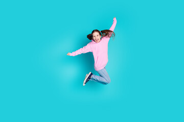 Wall Mural - Full size photo of pretty little girl jump have fun wear trendy pink outfit isolated on aquamarine color background