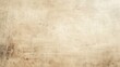 © Dexter - Close-up of a worn, beige surface with visible scratches and marks.