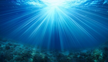 Wall Mural - sun shining light in blue clearly deep water sunbeams illuminate the blue underwater sea scene backg