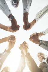 Canvas Print - People, team building and holding hands in meeting at office for collaboration, trust and solidarity. Low angle, employee and motivation with gesture in circle for business, partnership and agreement