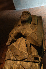 tomb with a statue of a medieval knight, carcassonne, france