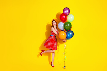 Canvas Print - Photo of gorgeous positive lady wear red stylish sarafan celebrate party event isolated on yellow color background