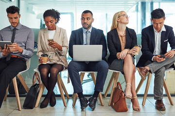 Poster - Business people, line and waiting room with technology for interview, career or job opportunity at office. Young, group or employees on chairs with laptop, tablet or phone for company search or offer