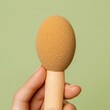 © Tuong - Makeup Sponges and Brush on Light Background for Flawless Application