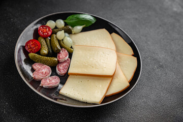 Raclette cheese tasty food dish fresh delicious gourmet food background on the table rustic food top view copy space top view