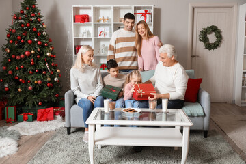 Canvas Print - Happy big family with Christmas presents at home