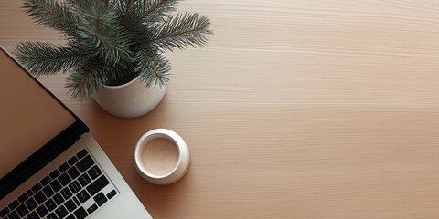 beech laptop on a light office table with decor in pastel colors