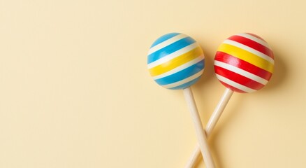 An illustration featuring maracas on a yellow background