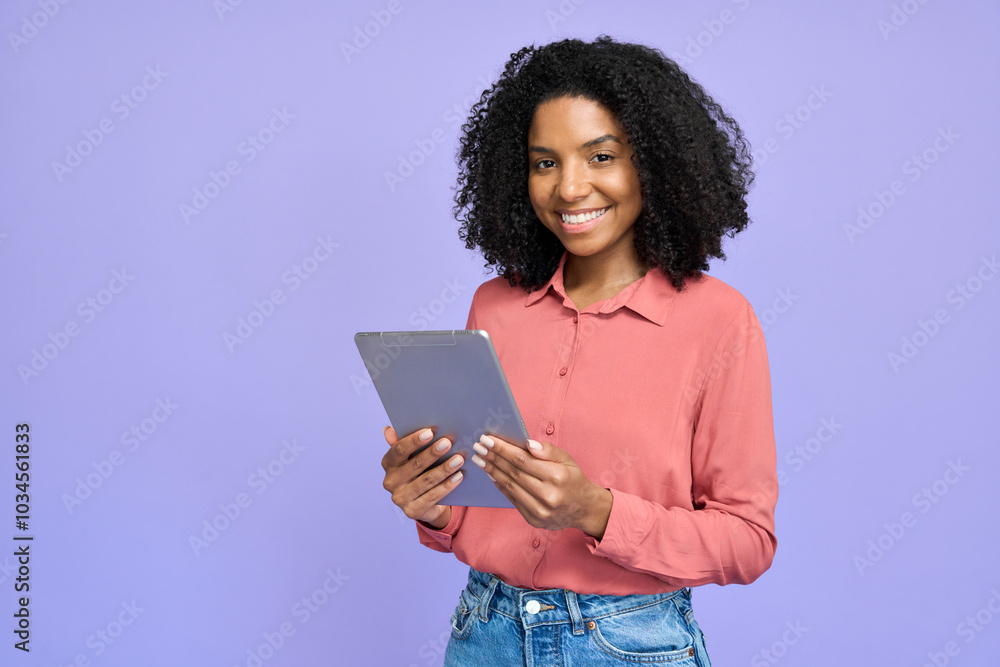 Happy young African American girl student holding digital tablet ...