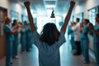 © Sasint - A cancer survivor ringing a bell in a hospital hallway, marking the end of their treatment, with doctors and nurses clapping in celebration, filled with bright light and emotions of triumph