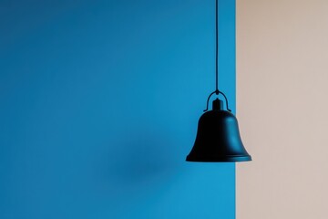 Poster - Black Bell-Shaped Light Fixture Hanging Against a Blue and Beige Wall