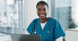 © peopleimages.com - Hospital, doctor and black woman with laptop, portrait and smile with research, online results and network. African person, medical or professional with computer, nurse and digital app with pride