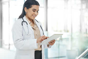 Canvas Print - Girl, doctor and typing with tablet in hospital for healthcare schedule, planning surgery and Telehealth. Woman, digital and medical research for health results, treatment feedback and history report