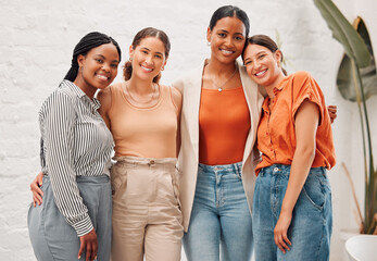 Canvas Print - Happy, portrait and team of businesswomen hug in office with diversity, collaboration or friendship. Smile, solidarity and group of female editors with creative career at copywriting magazine agency.