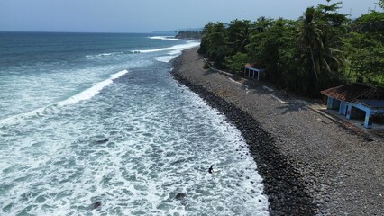 Summer seascape beautiful waves, blue sea water in sunny day. Top view from drone. Sea aerial surf, amazing tropical nature background. Mediterranean