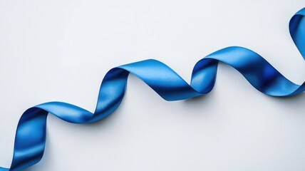 Close-up of wavy blue ribbon on white background