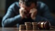 © Sandu - Gavel and Coins with Frustrated Man in Background