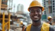 © Sandu - Construction Worker Smiling at Building Site