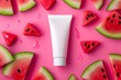 © Nataliia_Trushchenko - Tube of lotion is placed on top of a pink background with watermelon slices scattered around it. Concept of freshness, relaxation, as the lotion tube, watermelon slices are both associated with summer