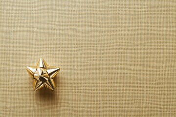 Poster - A luxurious golden bow rests in the corner of a textured wrapping paper, suggesting a festive occasion or surprise gift waiting to be unwrapped. Generative AI