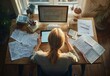 © SunPunjiStudio - Woman Working at Desk.