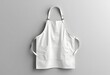 © Mahmudul - Blank apron with strap mockup, top view, 3d rendering. Empty chef or waiter uniform mock up, isolated. Clear protect dickey for housewife or butcher mokcup template.