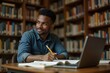 © DimmOFF - Smiling Student Studying with Laptop in Library