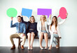 © Koegelenberg Coop/peopleimages.com - Business, people and happy in row with speech bubble for communication, marketing and text in white background. Employee, candidates and social media on portrait, mockup space for feedback and quote