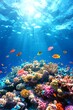 © Petchladda - Explore the beauty of a vibrant underwater coral reef teeming with colorful fish. Sunlight filters through the surface, illuminating the diverse marine habitat.