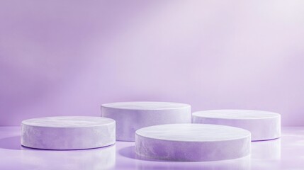 Poster - Four smooth, round platforms arranged in varying positions on a sleek, reflective surface, set against a calming purple backdrop, creating an inviting atmosphere for product presentations.