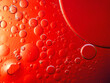 © NARONG - Abstract Background Red oil Macro Colorful artistic of oil drop floating on the water. macro red bubble oil of wallpeper, blood concept