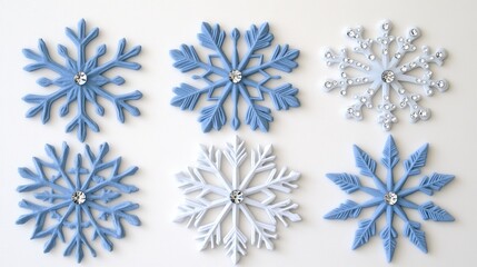 Sticker - exquisite light blue snowflakes embellished with white rhinestones set against a pristine white backdrop for winter decoration ideas