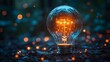 © Cattography - Glowing Incandescent Light Bulb with Warm Brilliant Filament Casting Soft Magical Glow against Blurred Bokeh Winter Background