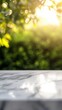© Pixels  - Smooth marble table surface with a blurred bush background, soft light reflecting for a clean, natural product promo