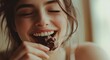 © Oleksandr - Woman Eating Chocolate. Beautiful Young Girl Indulging in Sweet Food for Happiness