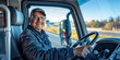 © Александр Марченко - Happy professional truck driver smiling while driving modern semi-truck on a highway