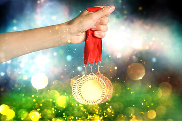 Woman with different medals at sports field, closeup