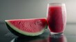 © TI3ee - A glass of refreshing watermelon juice next to a slice of watermelon.
