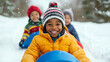 © Marketplace - Happy children enjoying a winter day, sledding in the snow. Their joyful expressions and colorful clothing create a vibrant, playful scene.