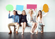 © Koegelenberg Coop/peopleimages.com - Business, people and smile in row with speech bubble for social media, advertise or text on white background. Employee, candidates and communication in portrait in mockup space, message or quote