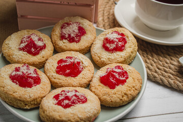 Wall Mural - Cookies with tea on a light table