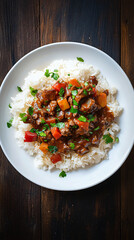 Wall Mural - Beef stew with vegetables served on white plate with rice and herbs on dark wooden table