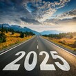 © Nima - A scenic road stretches forward, painted with the year 2025, symbolizing a new year, a fresh start, ambition, progress, and the journey ahead.