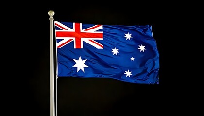 Australia Flag flying on a pole on a plain black background